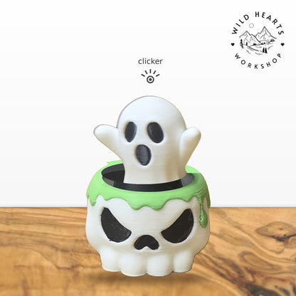 Ghost clicker top (white ghost) seated in the white skull pot with green slime rim base
