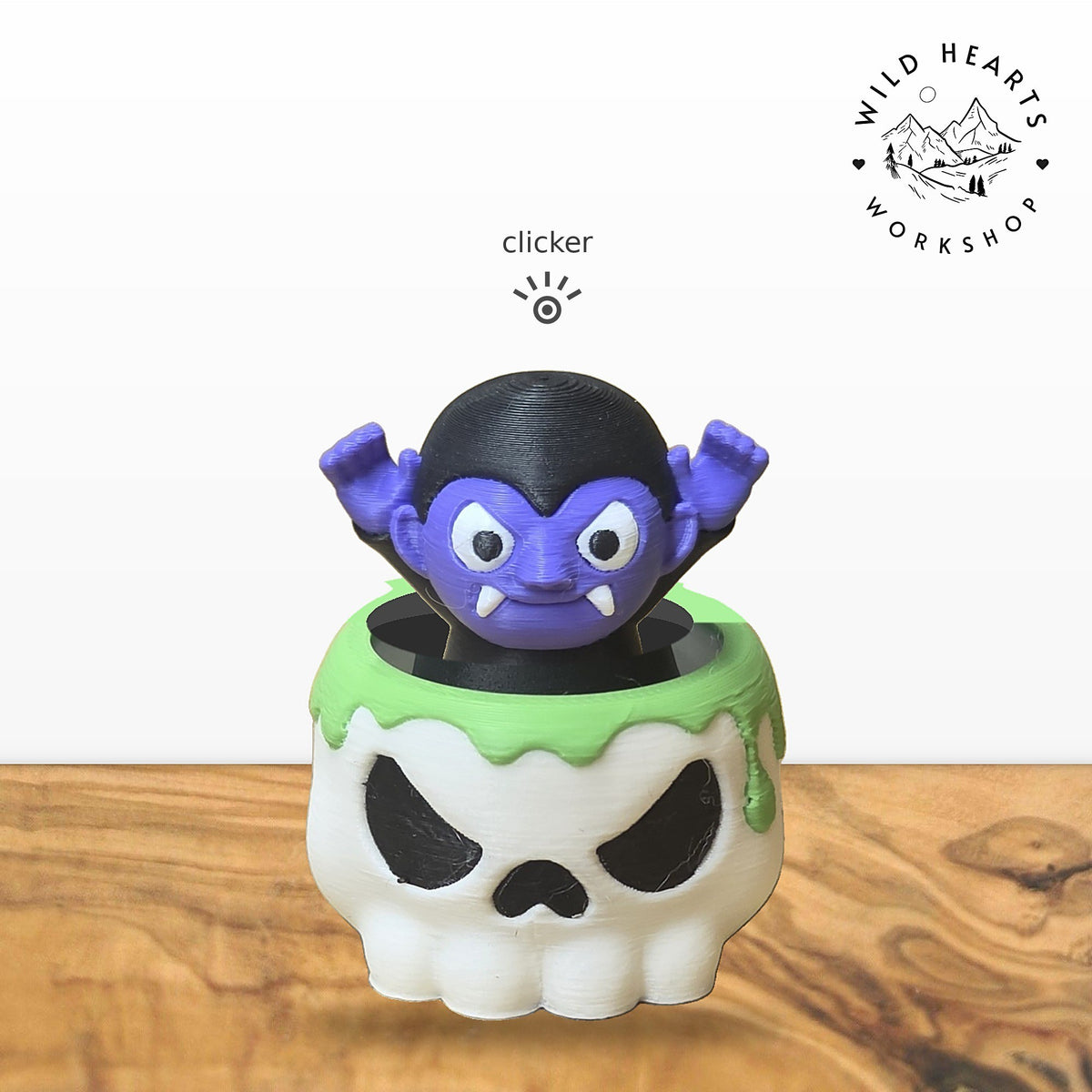 Vampire clicker top (purple vampire) seated in the white skull pot with green slime rim base